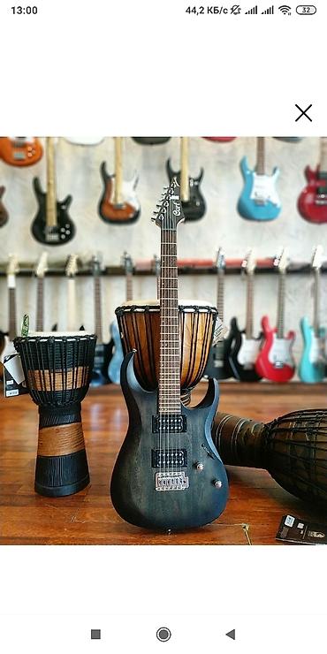Gitaralar: Mat görünüşün altında bir neçə tünd çaları beləcə ifadə edir! Model — 1