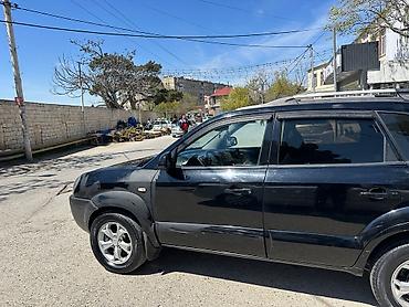 reduktor motor: Hyundai Tucson: 2 l | 2009 il Ofrouder/SUV — 9