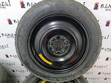2 gr: Колесо-докатка R16 135/85 на стальном штампованном диске - Диаметр — 1