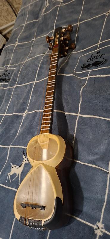elektro gitara satisi: Tar – milli simli musiqi aləti - Korpus: armud formalı iki kameralı — 4