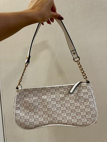 Çantalar: Orijinal juicy couture canta, Amerikadan alinib, yenidir. 100 azne — 2