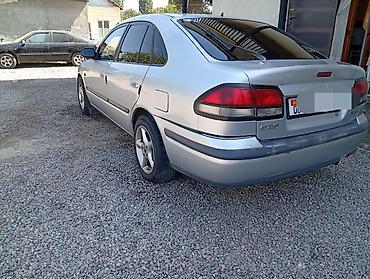 легкий карфакс: Mazda 626: 1998 г., 1.8 л, Механика, Бензин, Хэтчбэк — 4