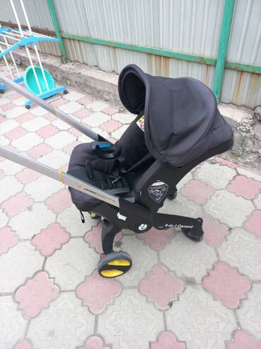 оюнчук машине: Коляска, цвет - Черный, Б/у