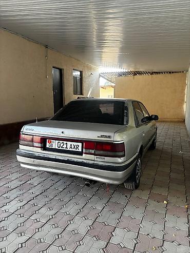 трос багажника камри 30: Mazda 626: 1991 г., 2 л, Механика, Бензин, Седан — 5