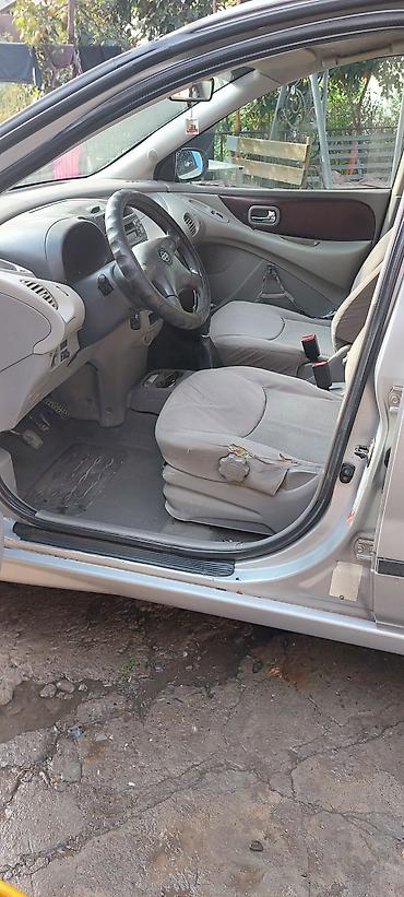 бензавоз: Nissan Almera Tino: 2001 г., Бензин, Минивэн — 3