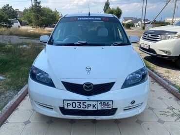 срочно продаю в связи с переездом: Mazda Demio: 2004 г., 1.5 л, Автоматтык, Бензин, Хетчбек