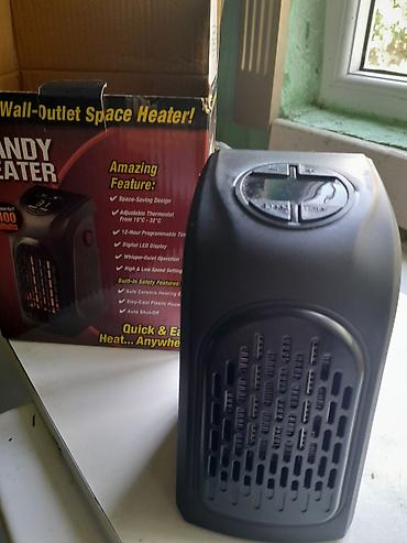 Elektrikli qızdırıcılar və radiatorlar: İki məişət cihazı bir yerdə: 1) Mini elektrikli isidici (Handy Heater — 1