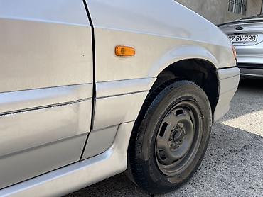 tap az vaz 2107: VAZ 2115 avtomobili, gümüşü rəngdə sedan kuzovlu modeldir. Şəkillərdə — 5