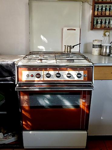 Продам газовую плиту с функцией гриль и газовой духовкой 60см./60см.