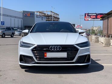купить запчасти на опель вектра б: Белый седан Audi A7 с динамичным дизайном и характерными элементами