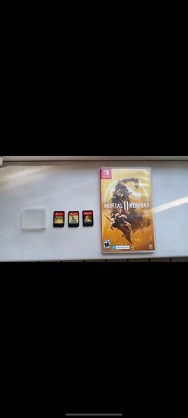 Video oyunlar və konsollar: Nintendo switch konsolu üçun oyun kartlicleri her biri ayriliqda 45m — 1