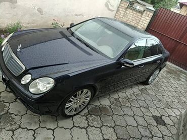 Mercedes-Benz E-Class: 2.4 л | 2003 г. | Седан