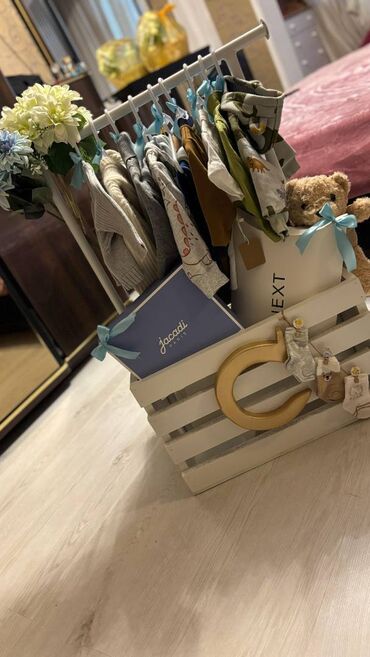 uşaq kiravat: Yeni Doğulan körpeler üçün boxçalar isdenilen madellde hazırlanır