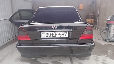 Mercedes-Benz sedan, qara rəng. Avtomatik transmissiya, çoxfunksiyalı