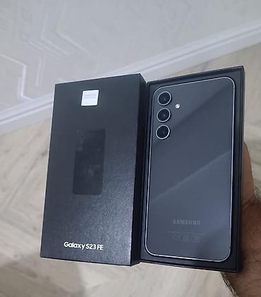 samsung s7230e wave 723: Samsung Galaxy S23 FE, rəng - Boz, Simsiz şarj — 1