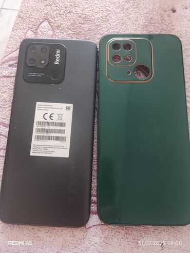 samsung a5 2017 qiymeti islenmis: Redmi mobil telefonu qara rəngdədir və arxa tərəfində "Redmi" loqosu