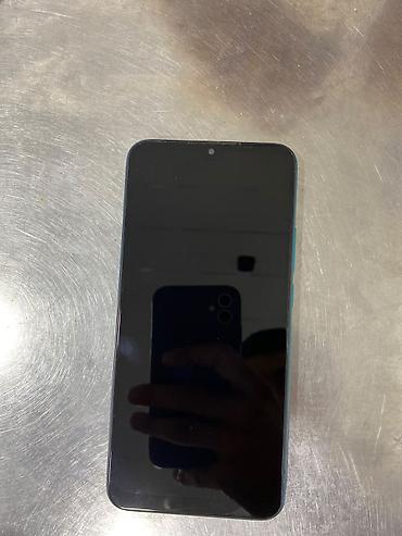 still cool android: Redmi smartfon – mavi rəng Xüsusiyyətlər: - Arxa tərəfdə AI Quad — 2