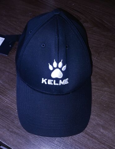 мужское пальто черное: Оригинальная Спортивная кепка от компании KELME черного цвета