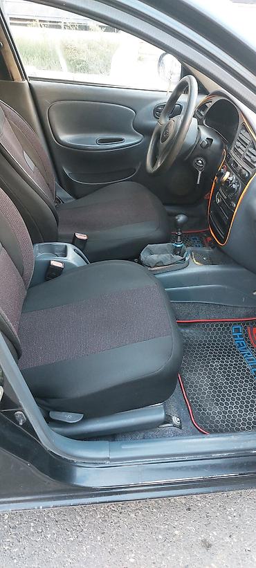 sukanlar: Daewoo Lanos: 1.5 l | 2011 il Sedan — 6