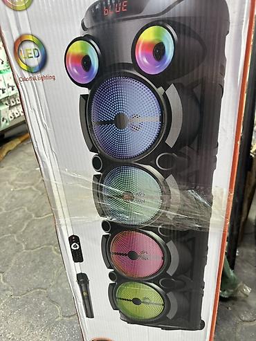 Портативная акустическая система (party speaker) с LED‑подсветкой