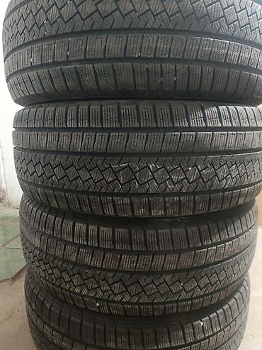 Комплект зимних шин Pirelli 235/60 R18 107H M+S - Размер: 235/60 R18
