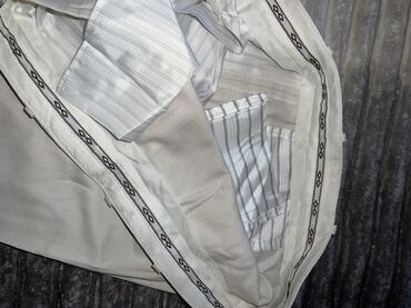 Ətəklər: Qara ətək dəsti - 2 ədəd ətək: biri klassik düz kəsimli qara ətək — 9