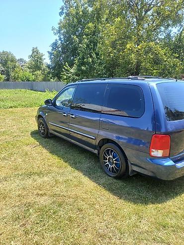 Kia: Kia Carnival: 2.9 l | 2002 il Van/Minivan — 5