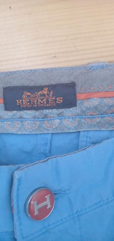 bele košulje: Hermès muške pantalone – model chino, svetloplave boje. - Brend — 1
