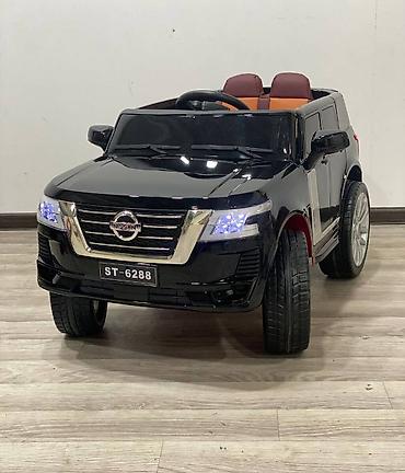Uşaq üçün elektrik maşınları: Uşaq elektrik cipi "Nissan" M 4837EBLR (4WD tam ötürücülü). İki — 3