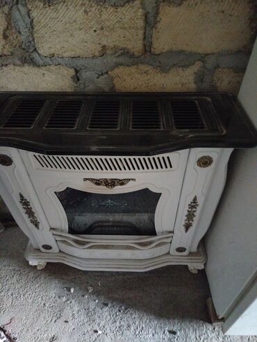 ev qapllar: Kamin Peçi, yanacaq - Qaz