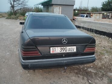 runx alex: Автомобиль Mercedes-Benz в кузове W124, окрашенный в темный цвет