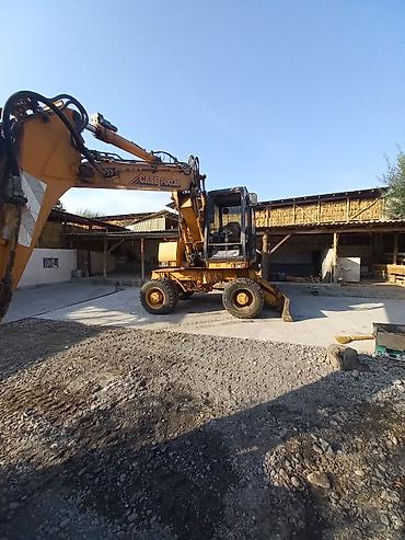 Экскаваторы: Экскаватор, Case, 1997 г., Колесный — 2