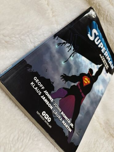 5 ci sinif rus dili ksq 1: Superman komiks kitabı. Üz qabığında "Superman" yazısı, həmçinin GEOFF