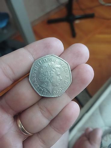 Britaniya 50 penslik sikkə - İl: 2006 - Forma: 7 bucaqlı (heptaqon) -