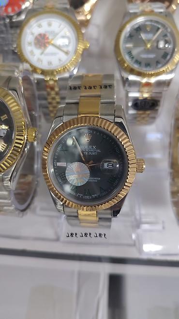 rolex daydate: Məhsul: Kvars mexanizmli klassik kişilər üçün qol saatları (Rolex — 9