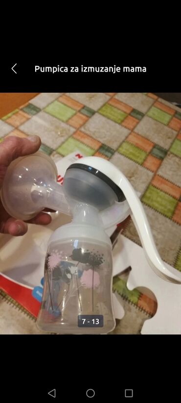 Ostale dečije stvari: Pumpica Nuk rucna za izmuzanje mama dojilja kao nova je 
 Mirjevo — 4