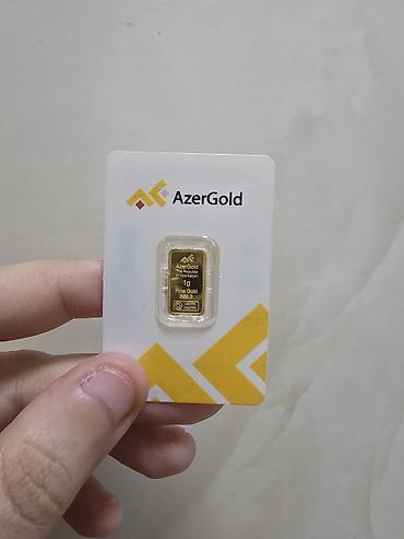 the tote bag: 1 qramliq Azergold kulcesi QR kodlu satilir. Kim istese 2 ve 5 qr var — 1