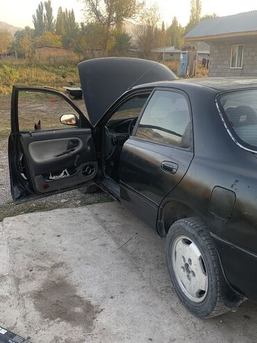 Mazda: Mazda 626: 1992 г., 2 л, Механика, Бензиновая, Седан — 11