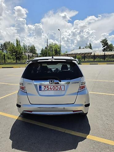 honda авенсис: Honda Jazz: 2011 г., 1.3 л, Вариатор, Гибрид, Хэтчбэк — 2