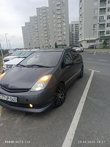 prius salon: Toyota Prius (2-ci nəsil) hibrid hetçbek - Kuzov: hetçbek, tünd boz — 5