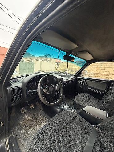 QAZ: QAZ 31105 Volga: 2.3 l | 2004 il Sedan — 9