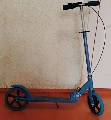 qaçış aparatı kreditlə: Şəhər içi rahat hərəkət üçün böyük təkərli skuter. Rahat 12 yaşa