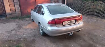 рушенная кукуруза: Mazda Cronos: 1994 г., 1.8 л, Механика, Бензин, Хэтчбэк
