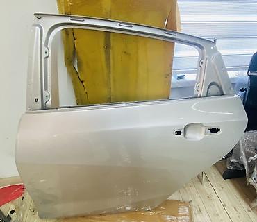 Avtomobil qapıları: Sağ arxa, Chevrolet eqonex malibu aviyo curuz, ABŞ — 1