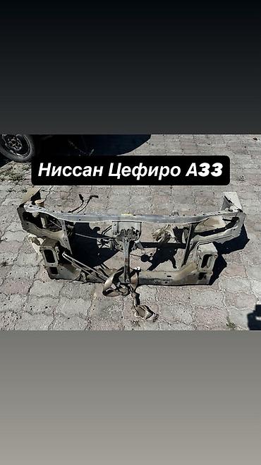 краном: Передний подрамник Nissan, Б/у, Оригинал — 1