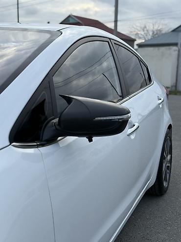 Kia: Kia K3: 1.6 l | 2014 il Sedan — 12