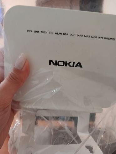 modem wifi: Nokia G-140W-G GPON Wi‑Fi router/ONT Xüsusiyyətlər: - GPON optik — 1