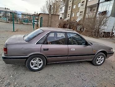 smart open: Mazda 626: 1989 г., 2 л, Механика, Бензин, Седан — 5