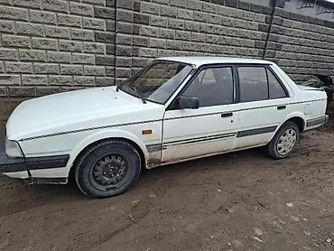 эштк: Mazda 626: 1972 г., Кол менен иштөөчү, Седан — 1