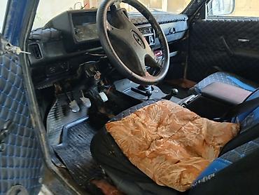 lada diskləri: LADA Niva 4x4, mavi rəng, 5 qapılı universal kuzov. Xüsusiyyətlər: - — 6